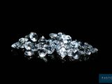 a pile of diamonds on a black background