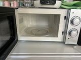 a microwave that is sitting on top of a counter