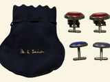 four pairs of cufflinks and a bag of cufflinks