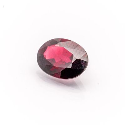 a pink tourmaline gems on a white background