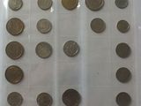 a lot of coins in a plastic bag on the table