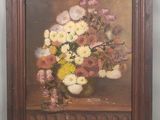 une peinture à l'huile représentant un vase de fleurs sur une table
