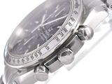 a close up of a wrist watch on a white surface