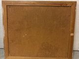 pair of vintage wood picture frames, one with a brown frame and the other with a black frame