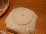 a white plate with a floral design on it