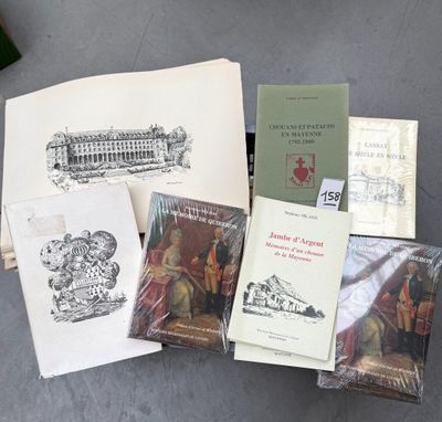 un grand nombre de livres posés sur une table
