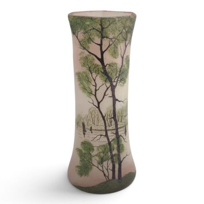 tall vase with a painting of trees and birds on it