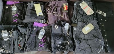 a suitcase filled with lots of different types of clothes
