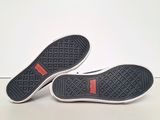 a close up of a pair of shoes on a white surface