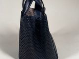a close up of a black purse with a strap on it