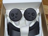 a box with a pair of headphones in it on a table