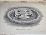 an old book with a drawing of a celtic cross on it