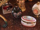 a table with a bunch of small decorative items on it