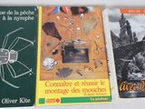 three books that are sitting on a table