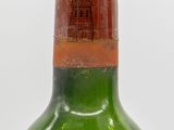 a bottle of wine that is sitting on a table