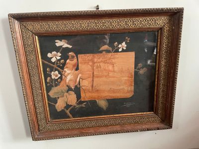 framed picture of a painting of a bird on a branch of a tree