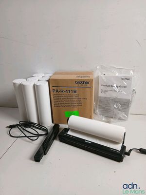 a couple of rolls of toilet paper sitting on top of a table