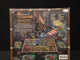 the board game has a wooden case with a picture of a pirate on it