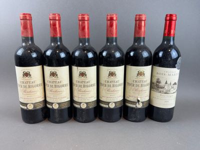 six bottles of wine are lined up in a row