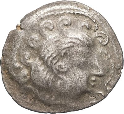 une pièce de monnaie en argent portant l'image d'un visage d'homme