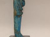 an image of a statue of a person on a black base