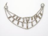a diamond and pearl necklace, by person