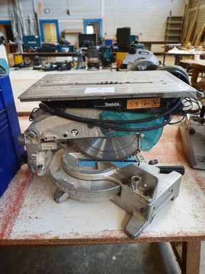 an image of a table saw in a workshop