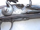 a gun that is sitting on top of a table
