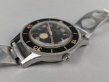 an image of a watch that is sitting on a table