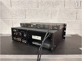 a black amplifier sitting on top of a table