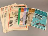 Plusieurs magazines, de types et de formats divers, sont empilés les uns sur les autres