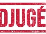 un tampon en caoutchouc rouge sur lequel est inscrit le mot « adjuge »