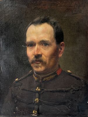 portrait d'un homme en uniforme militaire, portant une moustache et une barbichette