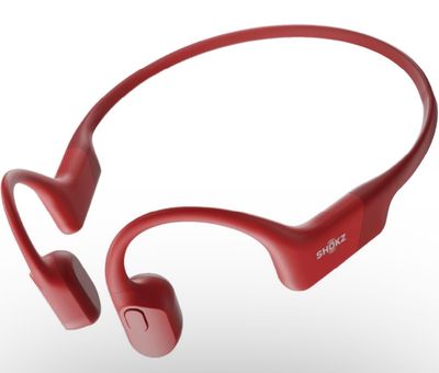 une paire d'écouteurs rouges posés les uns sur les autres