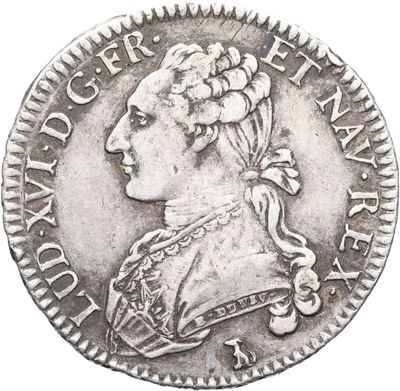 une pièce en argent avec l'image d'une femme de profil
