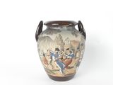 a vase with a painting on it on a white surface
