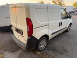 a white van that is parked in the parking lot