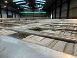 a large room with a lot of metal pipes in it