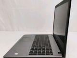 an open laptop computer sitting on top of a white table