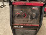 a machine that is sitting on the ground in the garage