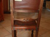 a wooden chair that has a label on it