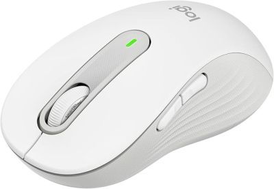 a close up of a computer mouse on a white surface