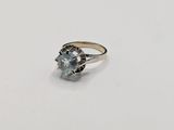 an image of a diamond ring on a white surface