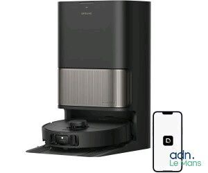 une photo d'une cafetière noire et argentée à côté d'un téléphone portable