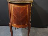 a small wooden table with a tray on top of it