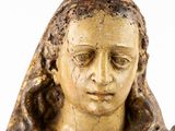an image of a statue of a woman holding a baby