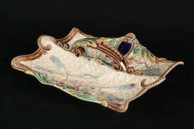 an image of a decorative dish with a fish on it