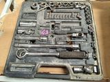 a tool tray that has a bunch of tools in it