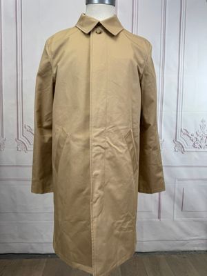 a beige coat on a mannequin mannequin mannequin mannequin mannequin mannequin mannequin mannequin mannequin