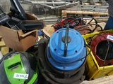 many different types of vacuums and other equipment on a pallet